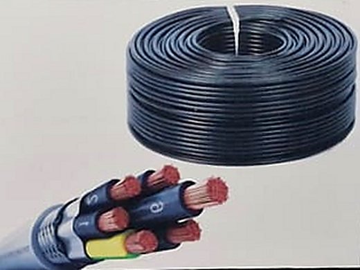 A coil of cable beside a multicore cable end